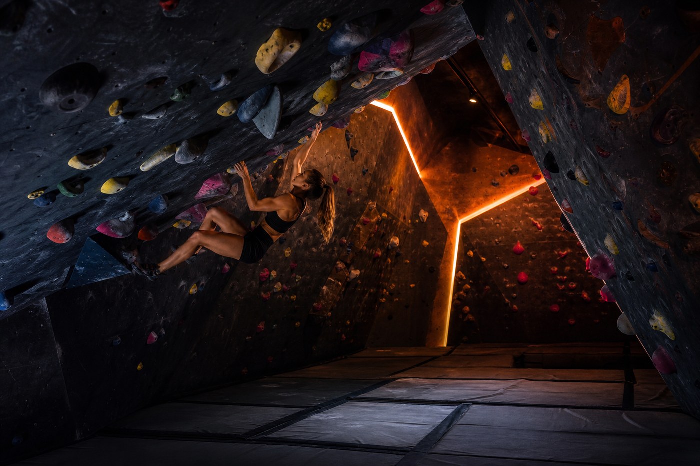 Steep bouldering cave with crash pads